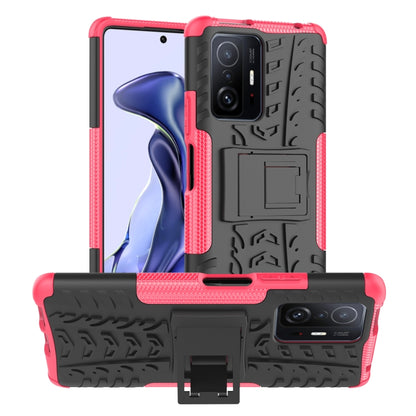 Red and black rugged phone case with holder kickstand, textured grip, and camera cover
