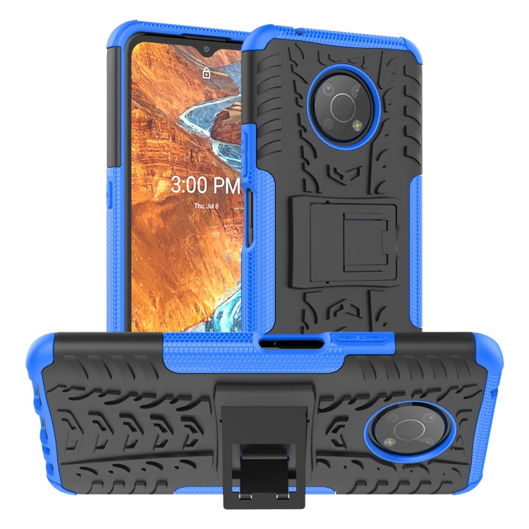 Blue tire-texture phone case with built-in holder and rugged TPU/PC bumper