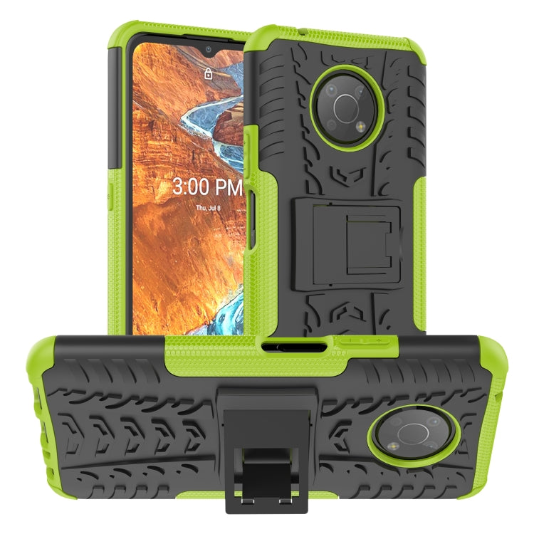 Neon green tire-texture phone case with built-in holder and rugged TPU/PC bumper