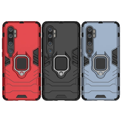 Rugged phone cases with magnetic ring holders: red, black, and navy