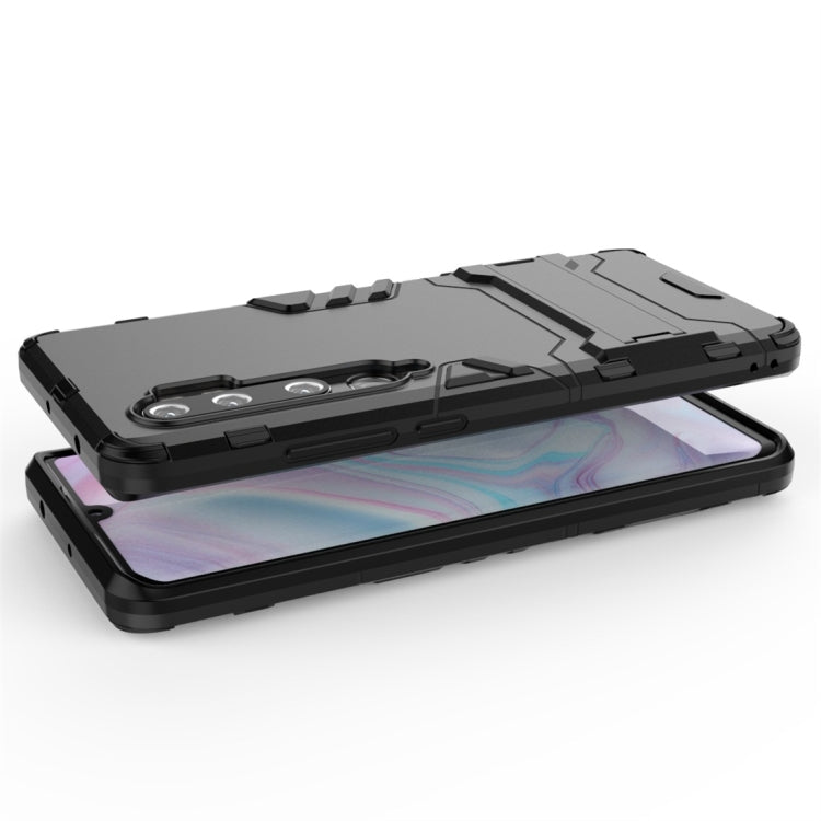 Shockproof black phone case with raised edges for screen and camera protection