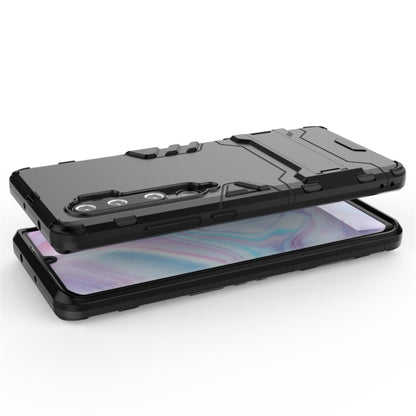Shockproof black phone case with raised edges for screen and camera protection