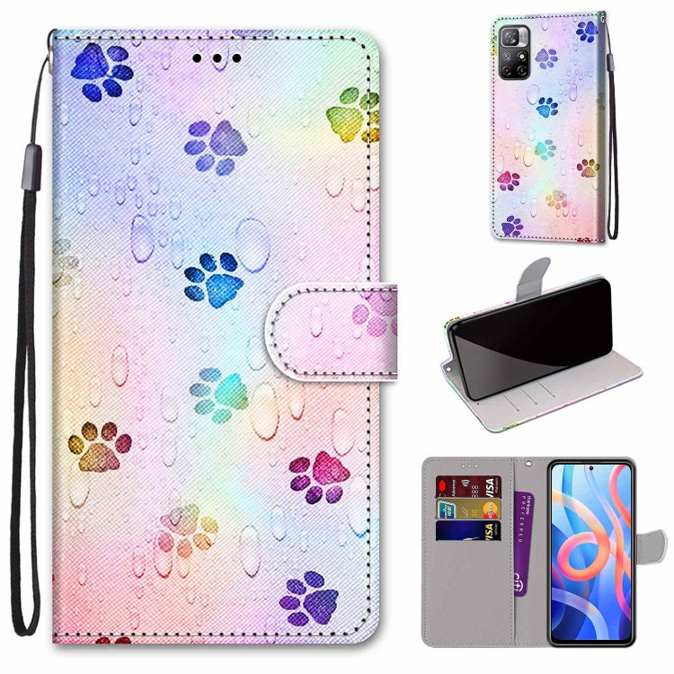 Phone wallet case with card slots and flip cover, lanyard; colorful paw print pattern.
