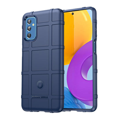 Rugged blue TPU phone case with textured surface, shockproof corners, and camera cutout.