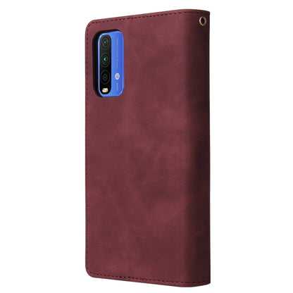 Wine red leather flip phone case with camera cutout and snap button