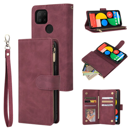 Wine red leather phone wallet case with card holder, zipper pocket, and wrist strap