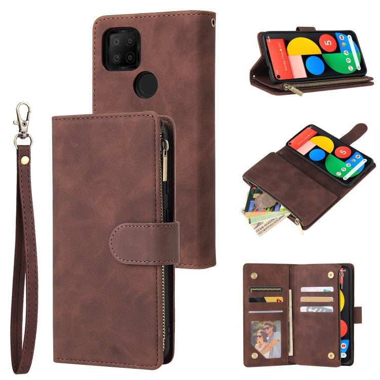 Dark brown leather phone wallet case with wrist strap, card slot, and zippered pocket
