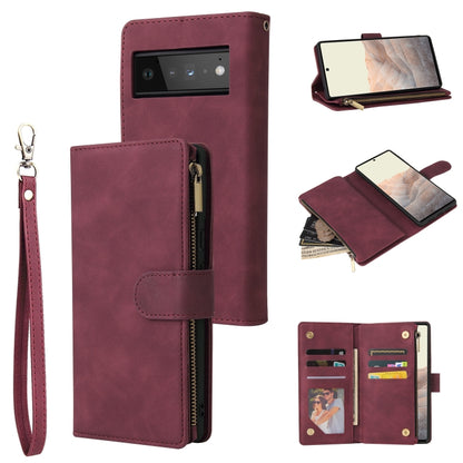 Wine red leather flip phone case with card slots and zipper pouch