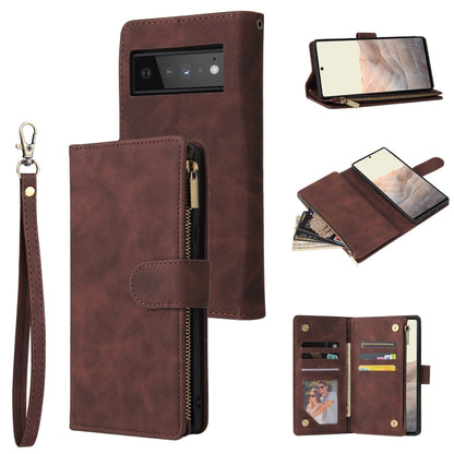Burgundy leather phone wallet case with wrist strap, card slots, and zipper pocket