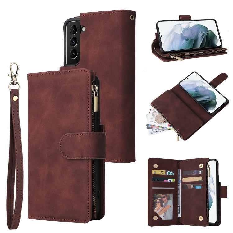 Reddish-brown leather phone wallet case with wrist strap, card holder, and zip pocket
