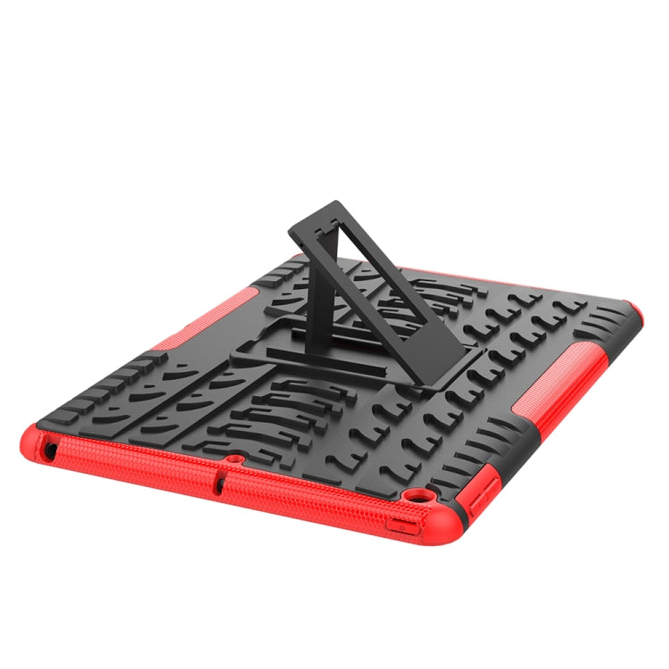Red and black rugged shockproof tablet case with tire texture and kickstand holder