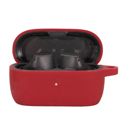 Silicone earbud protective case in wine red, open with two earbuds inside