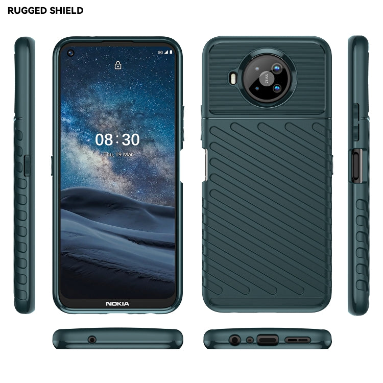 Rugged TPU phone case set in dark teal: front, back, sides with button cutouts
