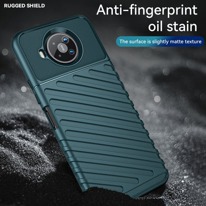 Dark teal TPU phone case with matte, anti-fingerprint style texture and camera opening