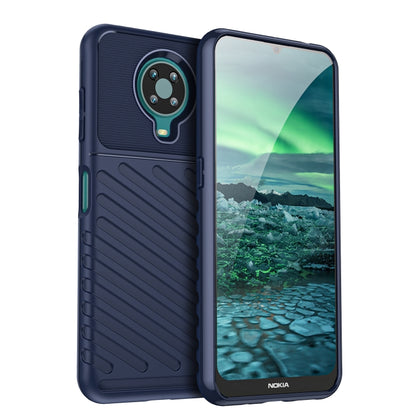 Rugged TPU phone case in navy blue with textured back, camera cutout, and side buttons