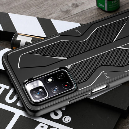 Black TPU phone case close-up showing camera openings and raised side buttons