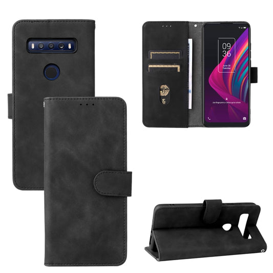 Black folio phone case with magnetic buckle and card slot, for TCL 10 SE.