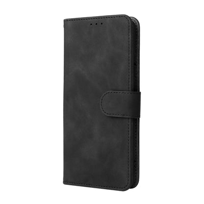 Black vertical flip phone case with magnetic buckle closure and stitched edges.