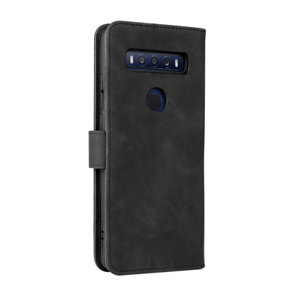 Black leather phone case with camera cutout and magnetic side strap.
