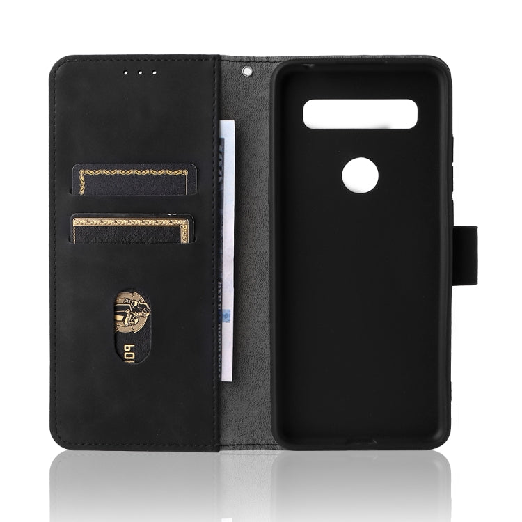 Black folio phone case opened, showing phone back cutout and card pocket.