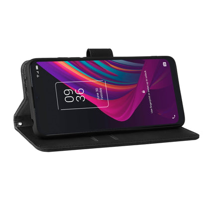 Black leather phone case stand mode with magnetic strap holding phone at angle.