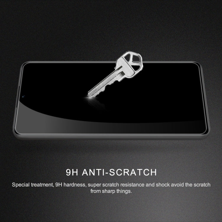 Tempered glass screen protector film on smartphone screen for scratch protection