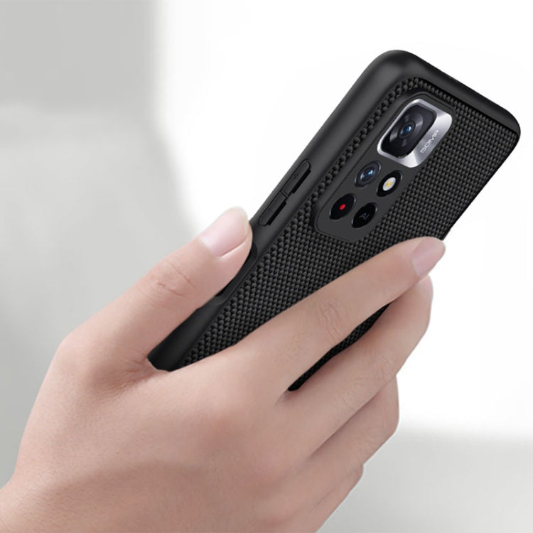 NILLKIN black textured TPU phone case shown in hand, camera module cutout