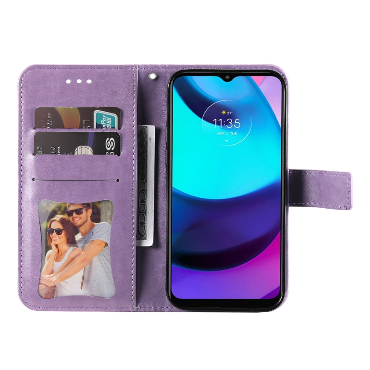 Light purple phone wallet case with embossed floral design, card slots, and flip cover