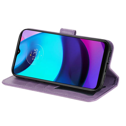 Light purple flip phone case with embossed floral mandala pattern and horizontal viewing stand