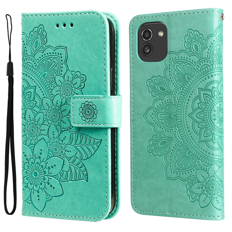 Mint green embossed floral flip phone case with wrist strap and card cutout.