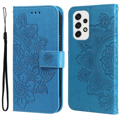 Blue wallet-style phone case with embossed 7-petal floral pattern and camera cutout
