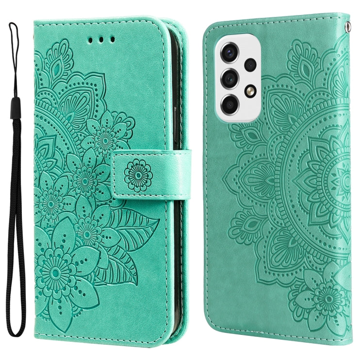 Green wallet-style phone case with embossed 7-petal floral pattern and camera cutout