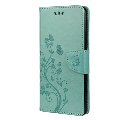 Green leather flip phone case with butterfly-flower pattern and card holder