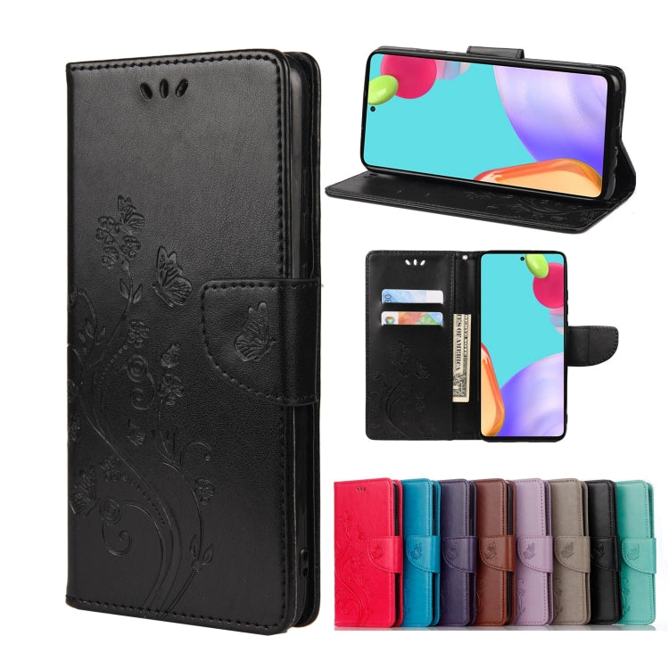 Black leather phone case with butterfly floral embossing, card slot, and stand flap.