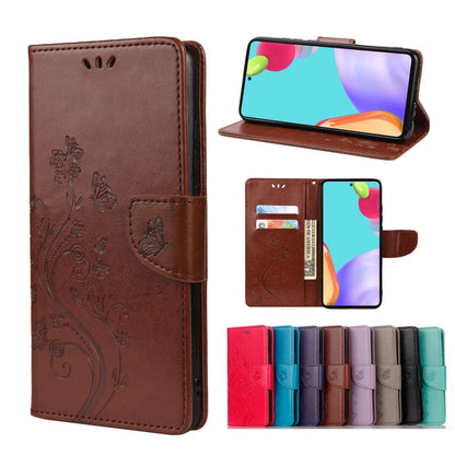 Espresso brown leather phone case with butterfly floral embossing, card slot, and stand flap.
