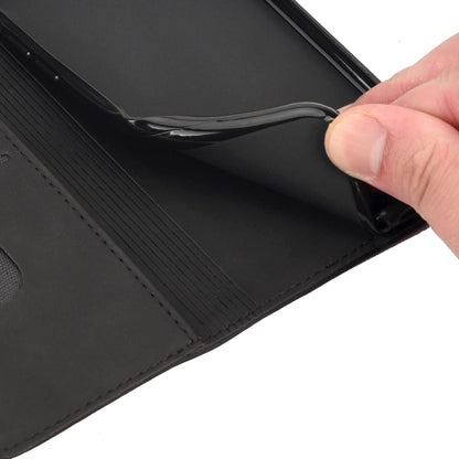 Black leather-style phone case interior pocket with stitched texture and opening