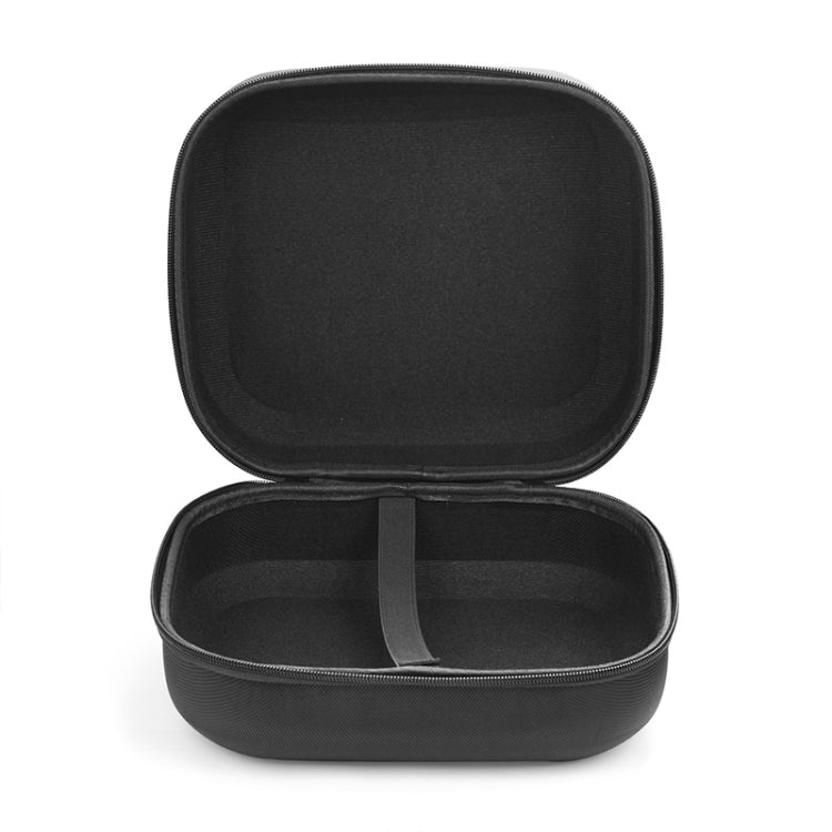 Open black headphone storage case with cushioned interior and divider