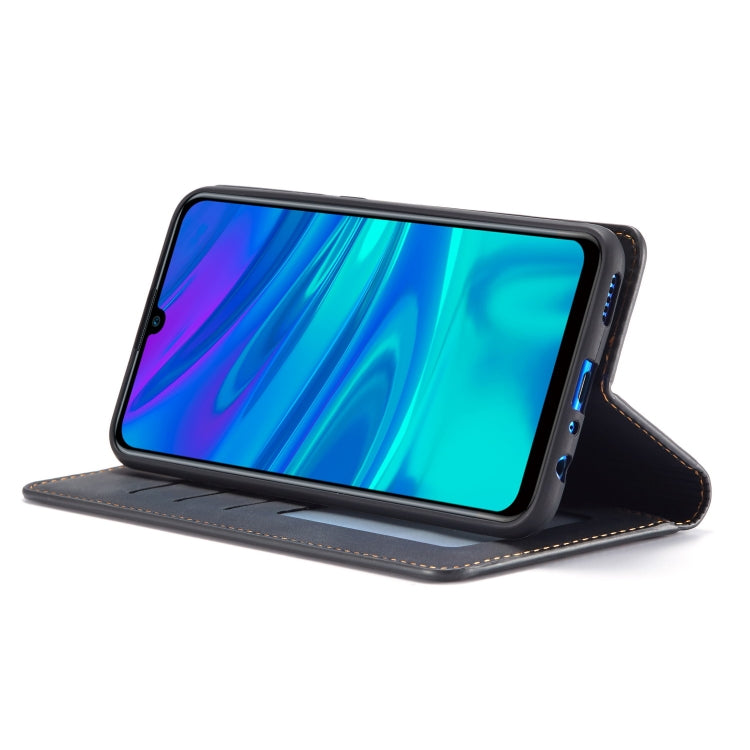 Flip leather phone case with kickstand, black; holds phone at an angled viewing position