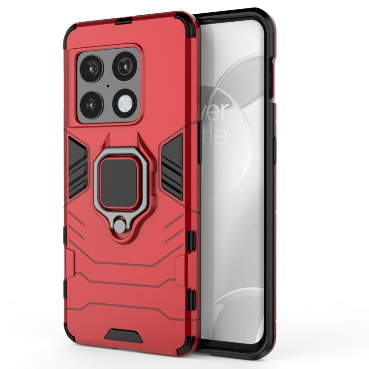 Red rugged shockproof phone case with raised camera cover and ring-style kickstand