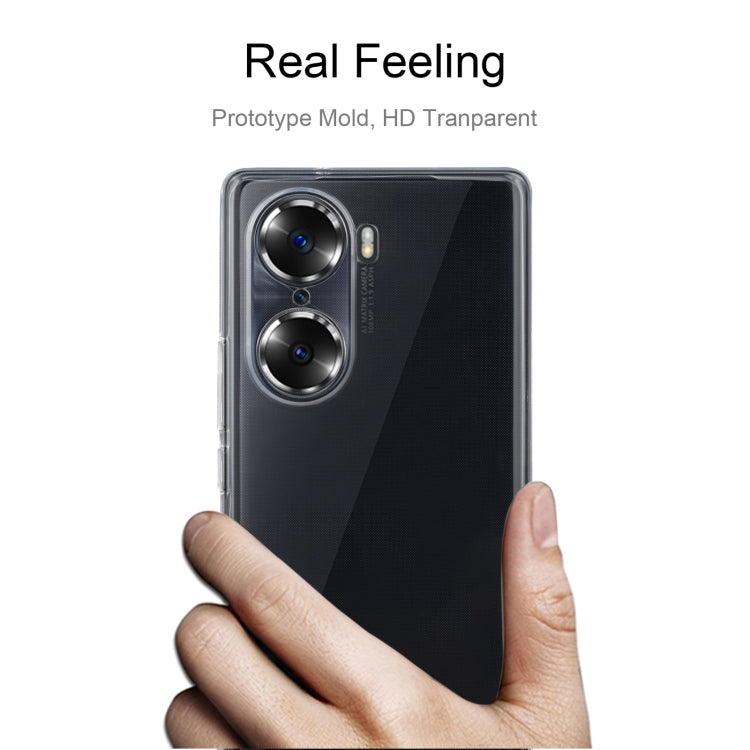 Clear TPU phone case held in hand, showing camera cutout and slim profile