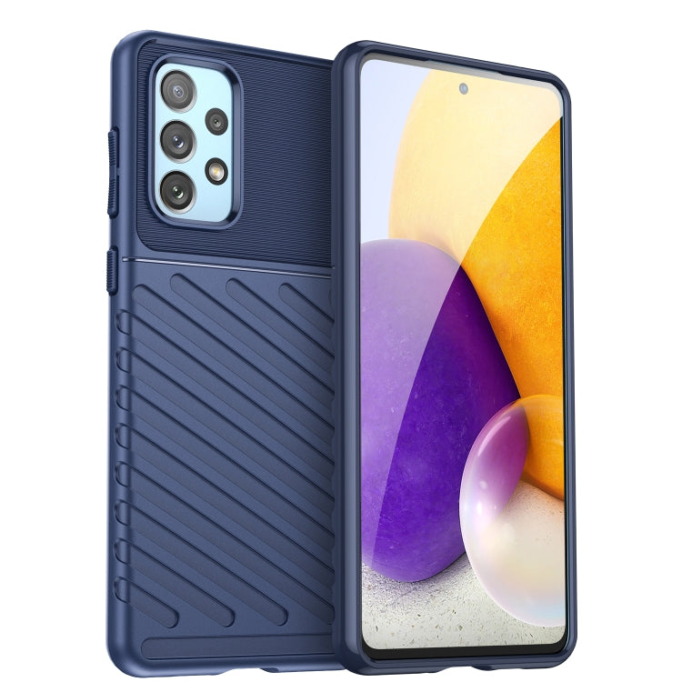 Blue rugged TPU phone case with raised edges, textured grip, and camera cutouts
