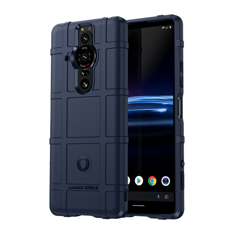 Rugged shockproof TPU phone case in navy blue with camera cutouts and raised front lip