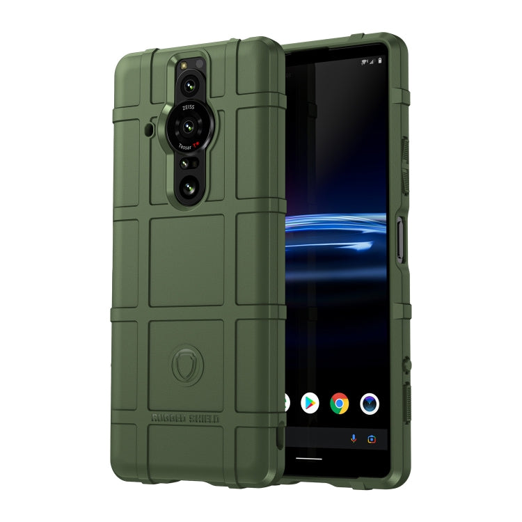 Rugged shockproof TPU phone case in deep green with camera cutouts and raised front lip