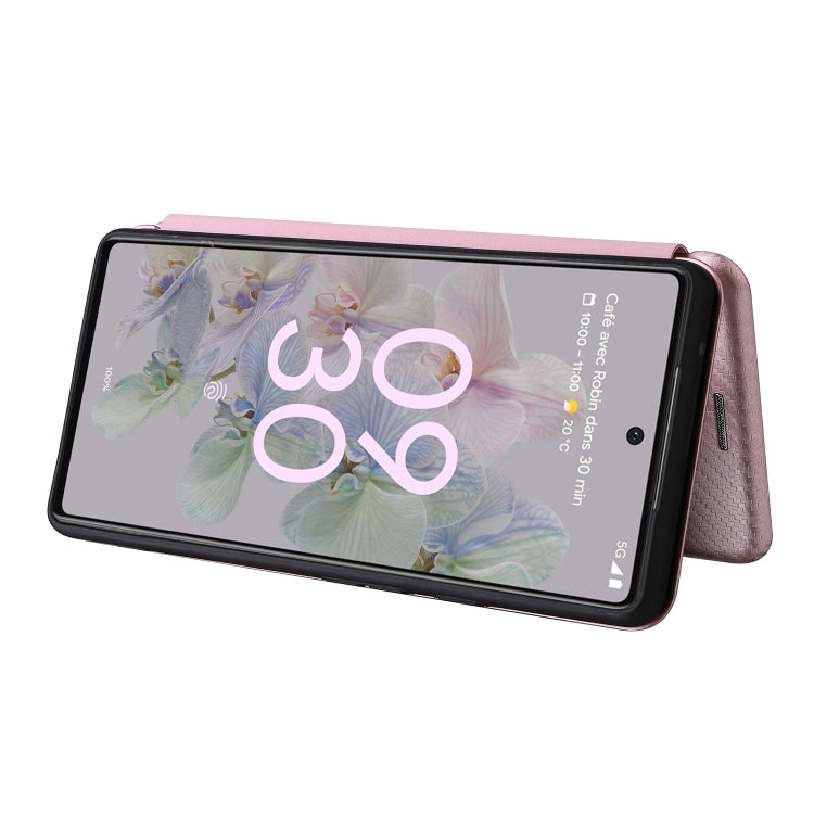 Pink magnetic flip phone case with carbon-fiber texture for Google Pixel 6a, phone mounted