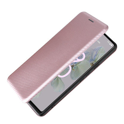 Pink carbon-fiber texture magnetic flip phone case for Google Pixel 6a, angled view