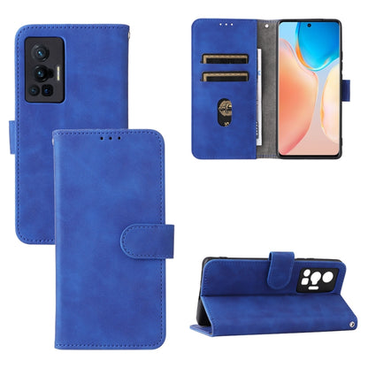 Blue leather magnetic phone case with flip cover, card slots, and stand.