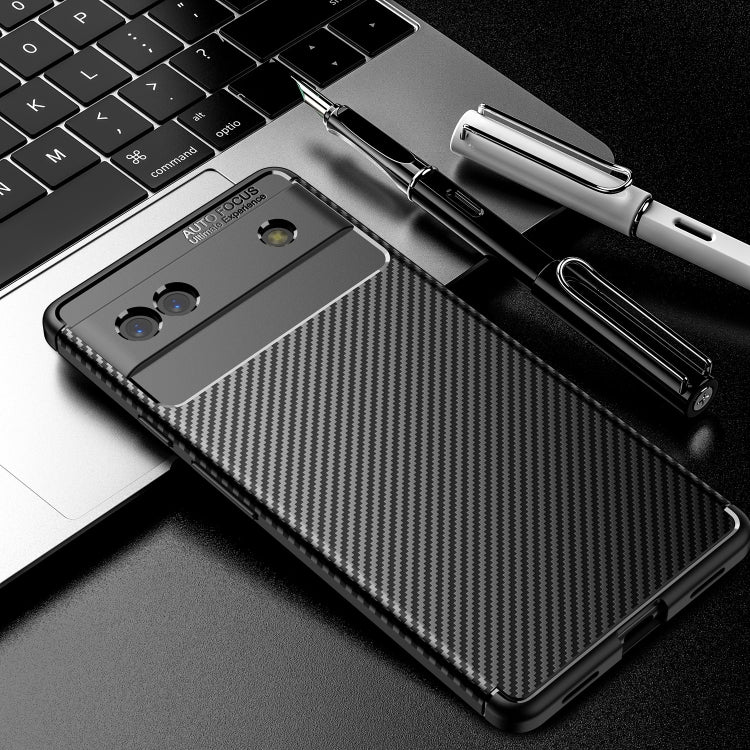 Black TPU phone case with carbon-fiber texture, camera openings and raised edges