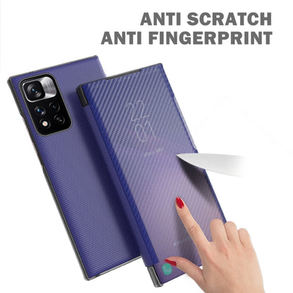 Carbon-fiber textured flip phone case, dark blue/purple, back camera cutout visible.