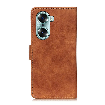 Brown leather flip phone case with cutouts and camera protection for phone