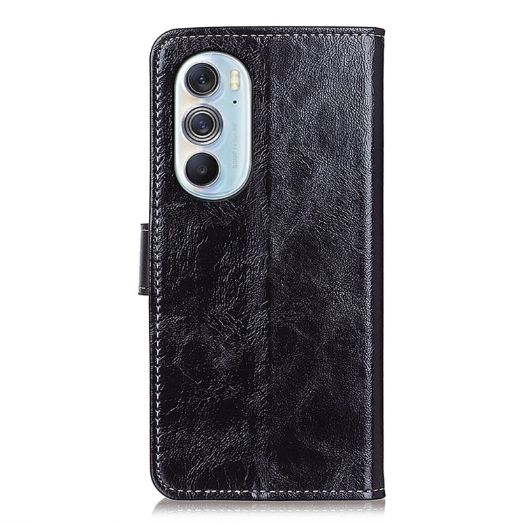 Black leather phone case with camera cutout and flip strap, back view